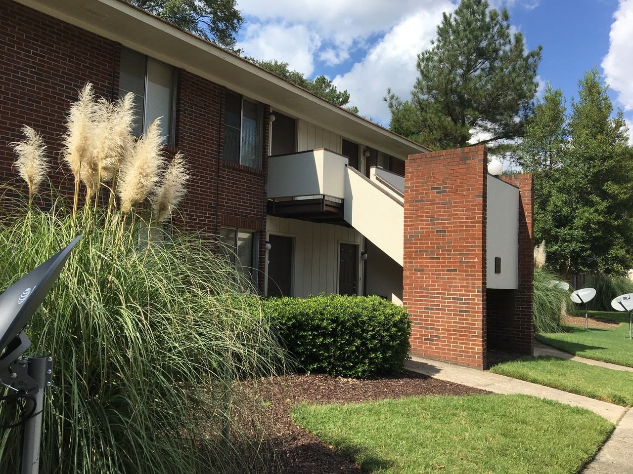 Bella Cove Apartments - Photo 2 of 7