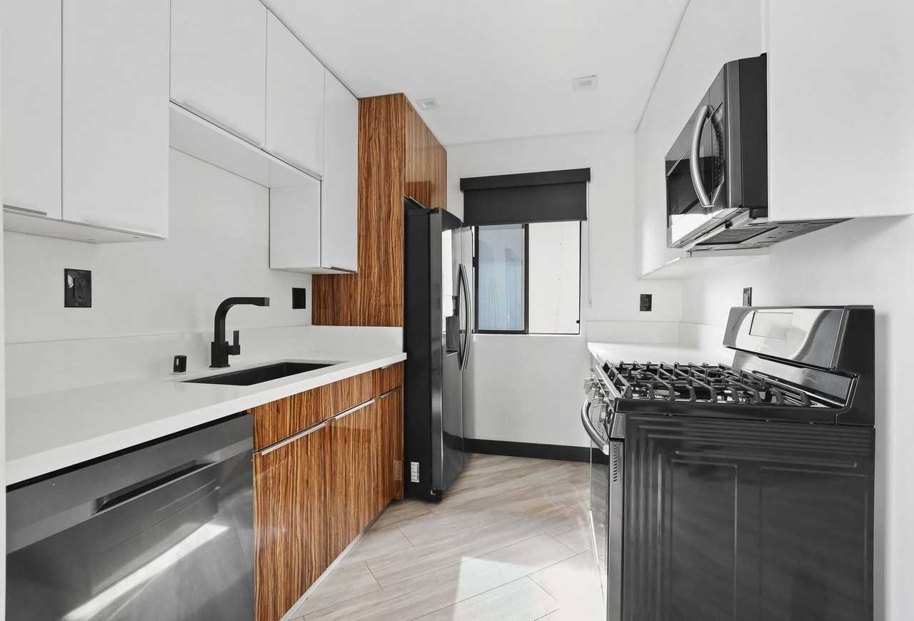 5667 La Mirada Avenue Apartmenets - Photo 6 of 18