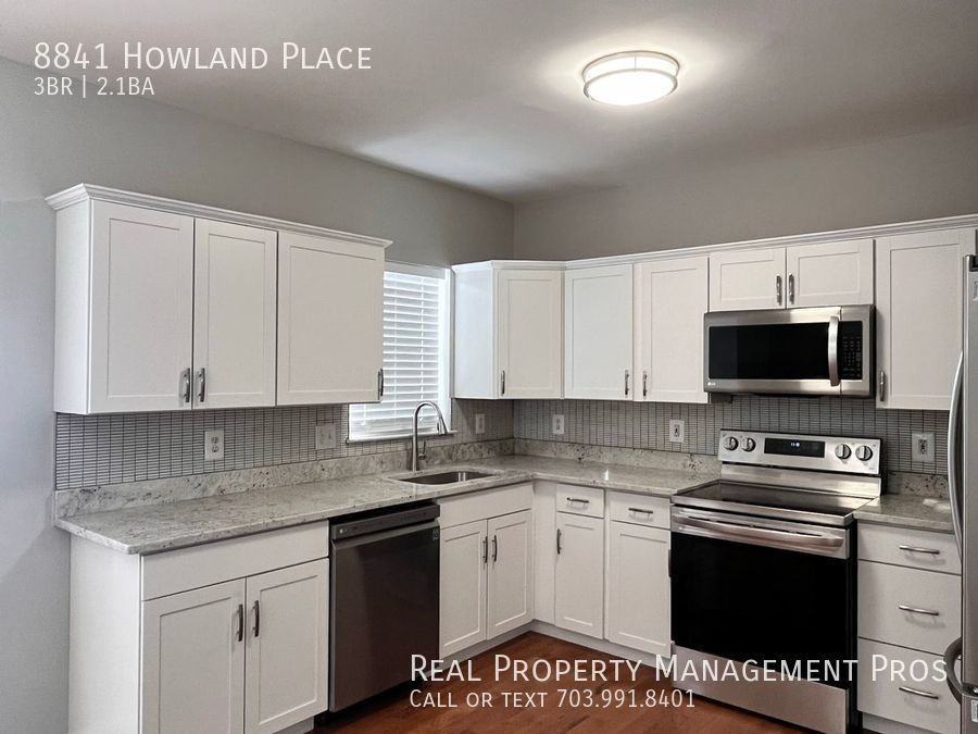 8841 Howland Pl - Photo 2 of 30