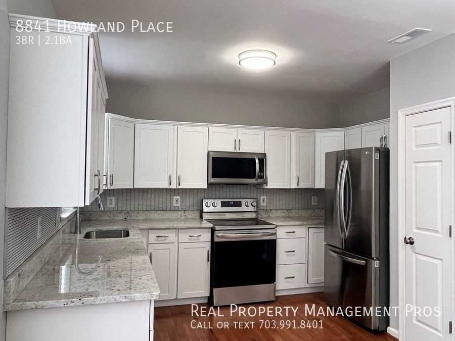 8841 Howland Pl - Photo 3 of 30