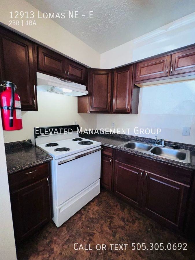 12913 Lomas Blvd Ne #E - Photo 3 of 18