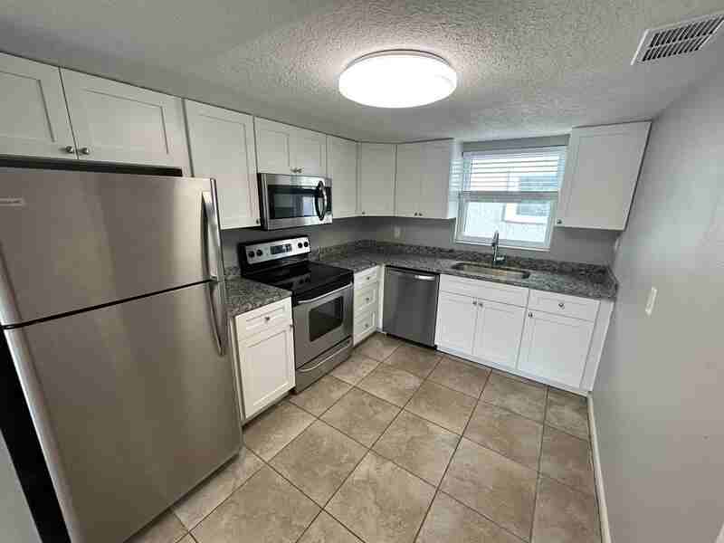 7002 S Kissimmee St - Photo 6 of 14