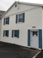 featured image of 104 E Washington St