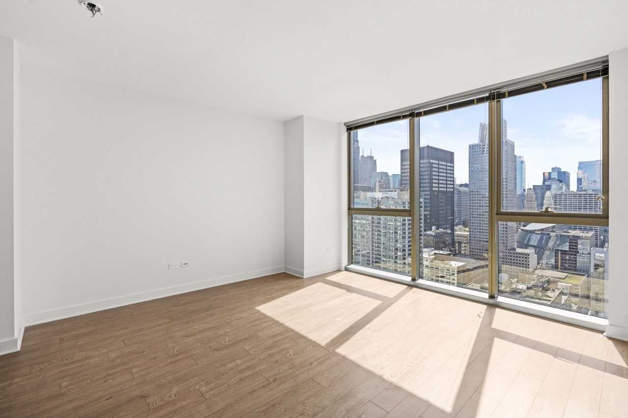 201 N Garland Ct - Photo 3 of 22