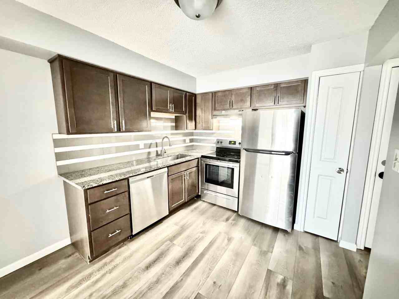 1256 The Gardens at Walled Lake Apartments - Photo 2 of 13