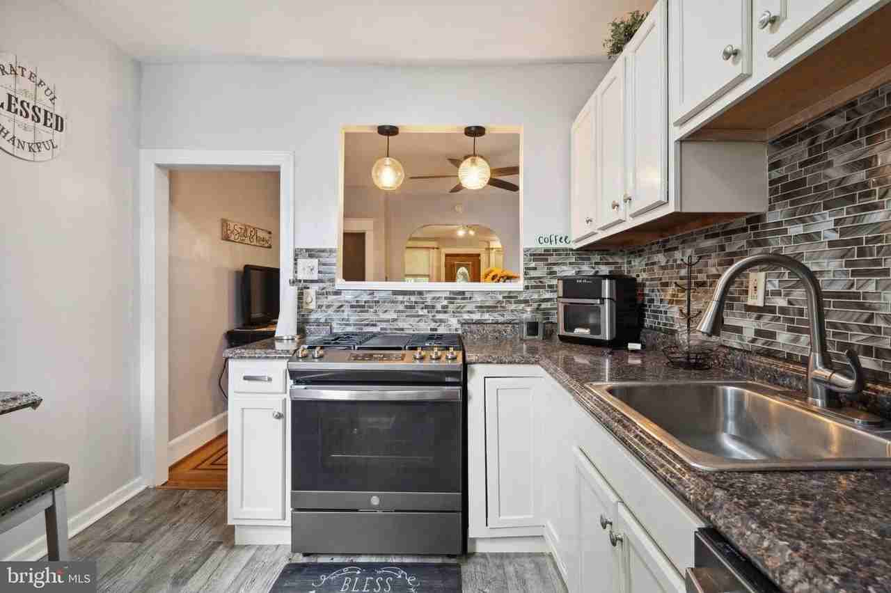 7117 Woolston Ave #NA - Photo 2 of 14