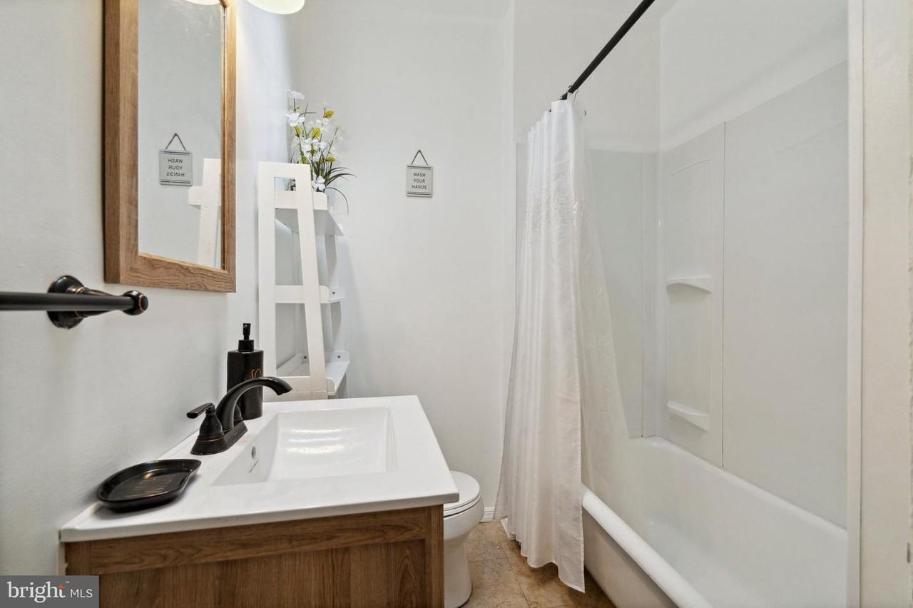 7117 Woolston Ave #NA - Photo 5 of 14