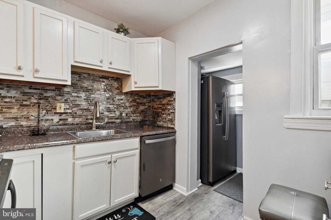7117 Woolston Ave #NA - Photo 4 of 14