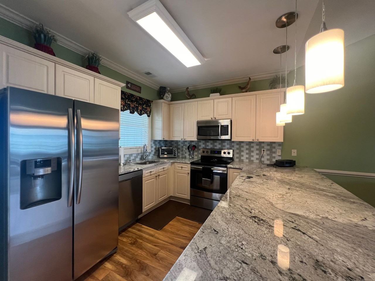 4887 Luster Leaf Cir #402 - Photo 3 of 17