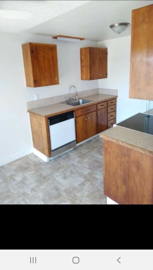 Spacious One & Two Bed Units in a Quite complex with Porches and Covered Off Street Parking - Photo 2 of 23