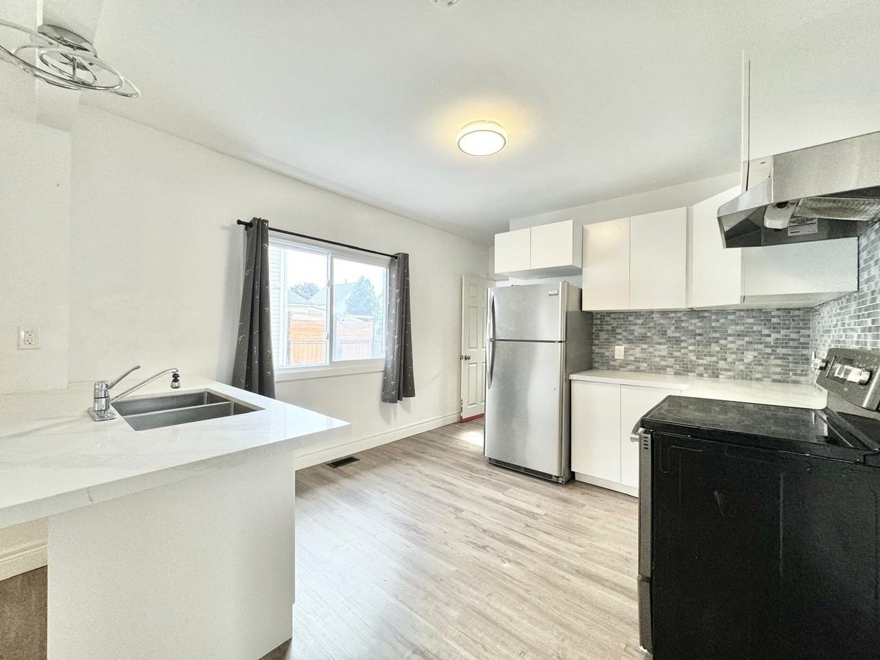 5759 Leonard Ave #1UPPER - Photo 2 of 13