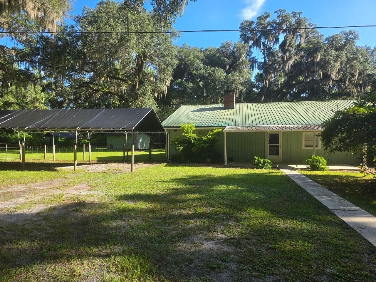 10216 Ne County Road 1469 - Photo 3 of 25