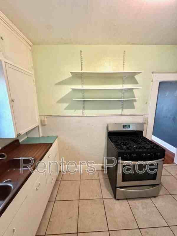 1148 S Saint Louis Ave - Photo 3 of 8
