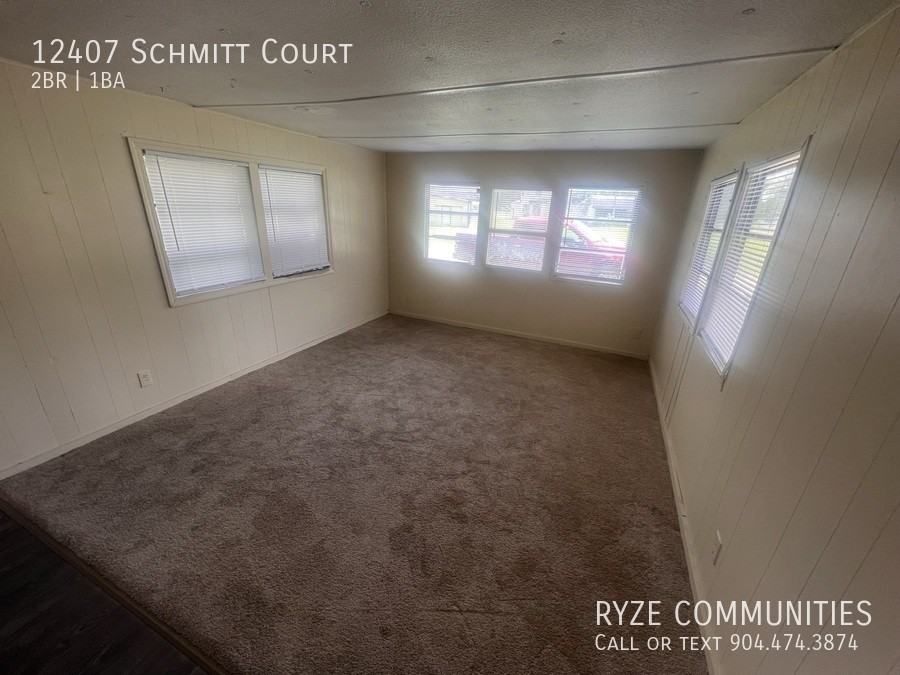 12407 Schmitt Ct N - Photo 2 of 8