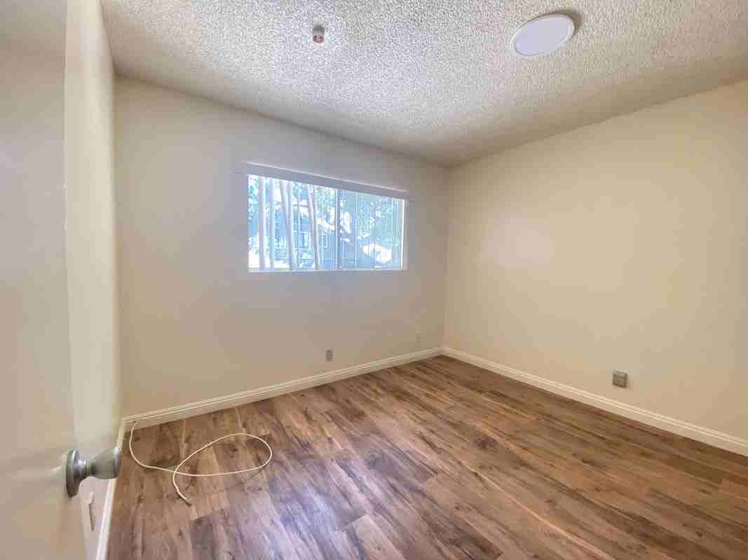 128 W 3rd St - Photo 2 of 3