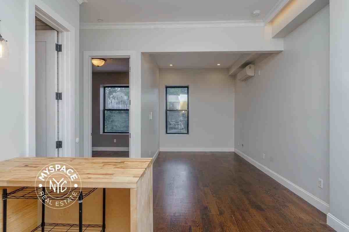 6080 Myrtle Ave #3c - Photo 2 of 11