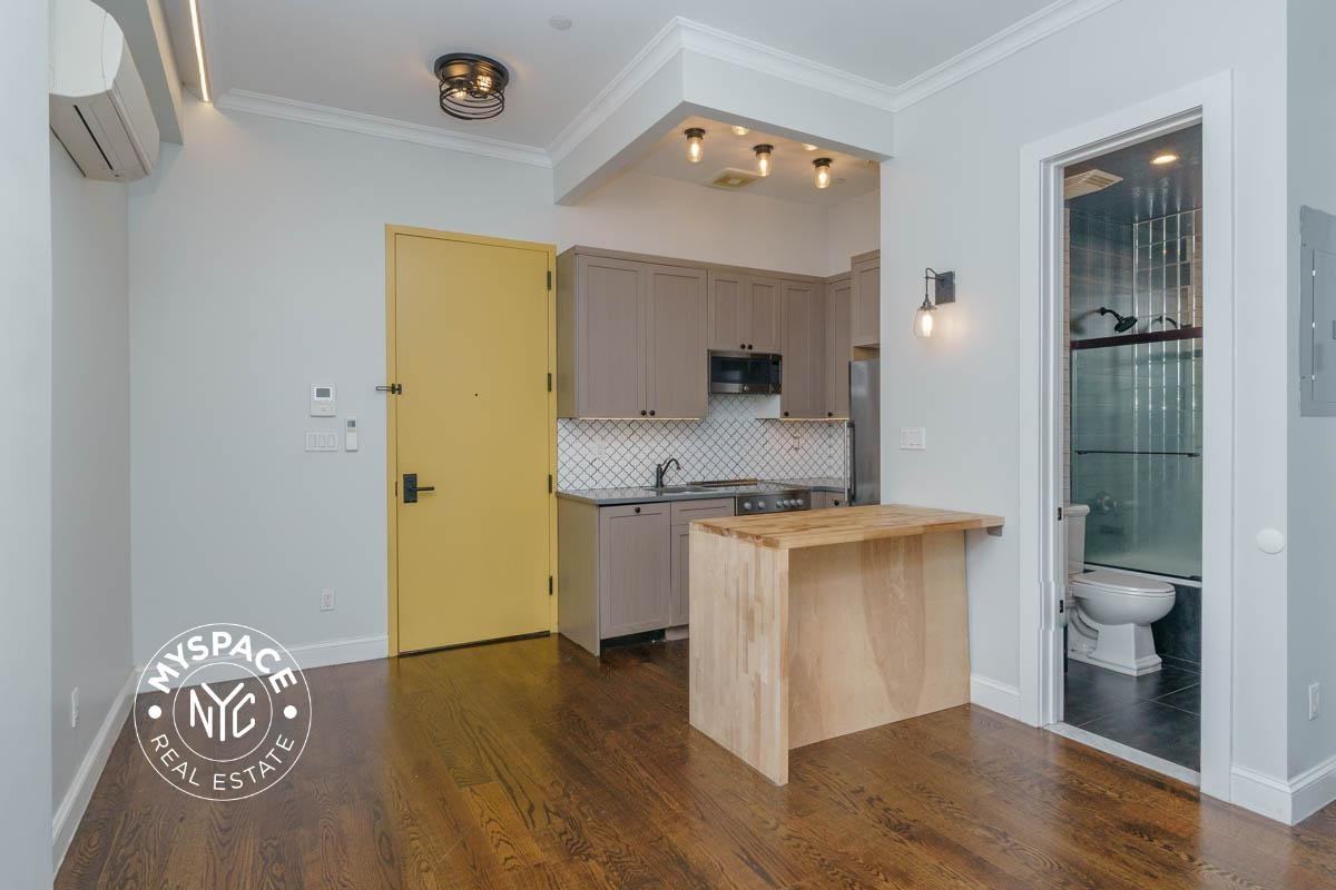 6080 Myrtle Ave #3c - Photo 3 of 11