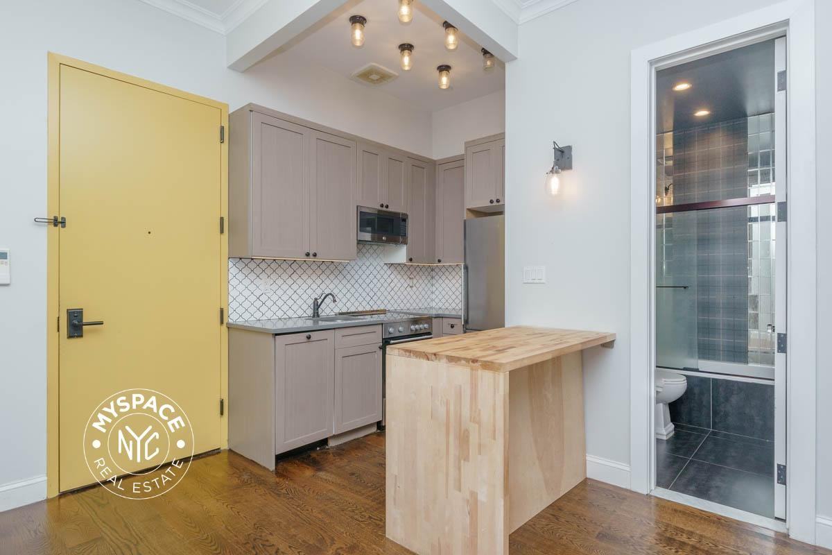 6080 Myrtle Ave #3c - Photo 4 of 11