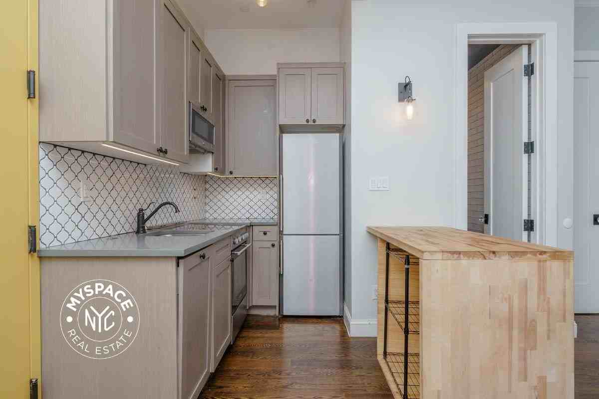 6080 Myrtle Ave #3c - Photo 5 of 11