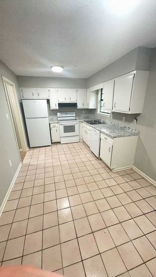 Tree House Townhomes - Photo 2 of 10