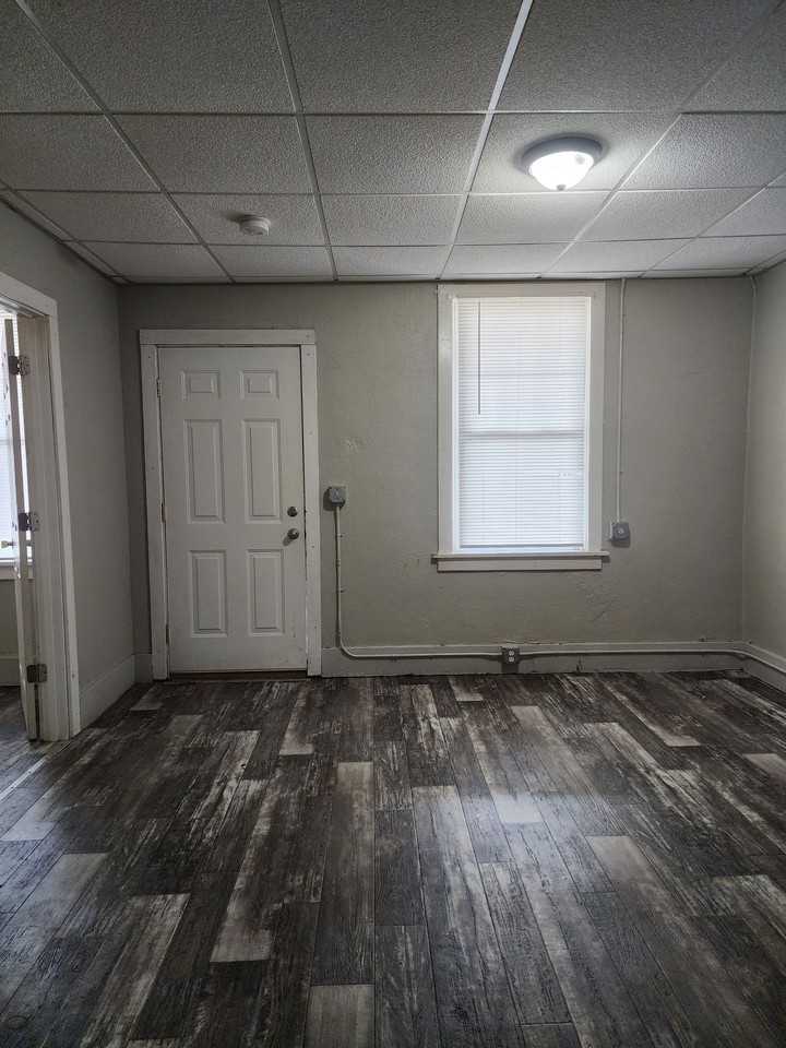 Rustic Apartments on 2nd - Photo 2 of 7