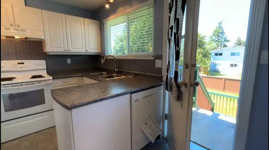 4693 55 St #A - Photo 2 of 22