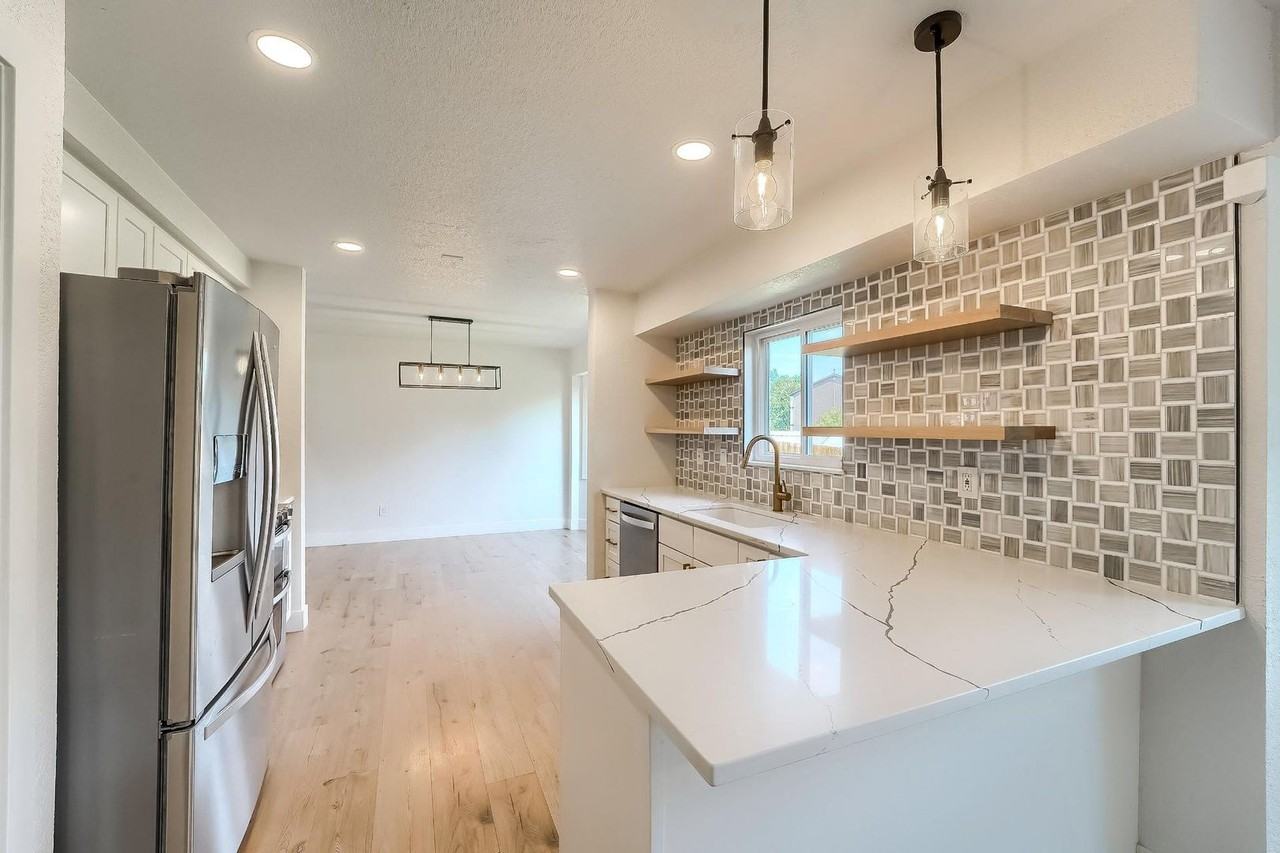 9923 E Exposition Ave - Photo 4 of 50