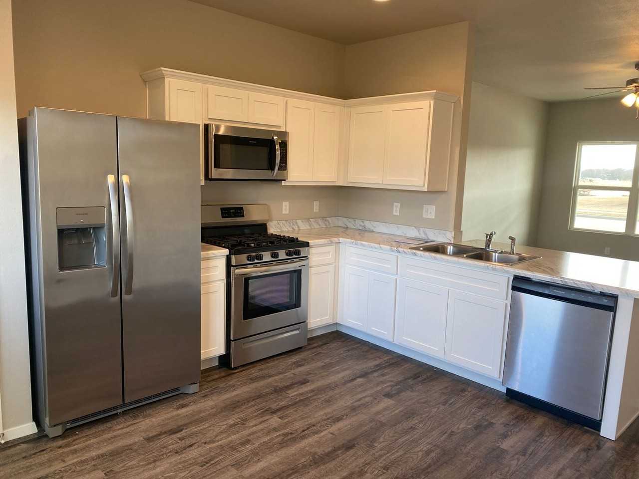 14136 N 74th East Ave - Photo 7 of 18