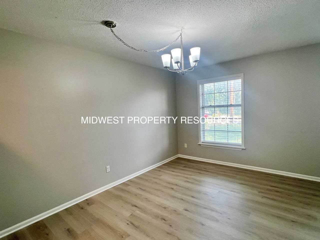 907 Nw Colbern Rd - Photo 4 of 14