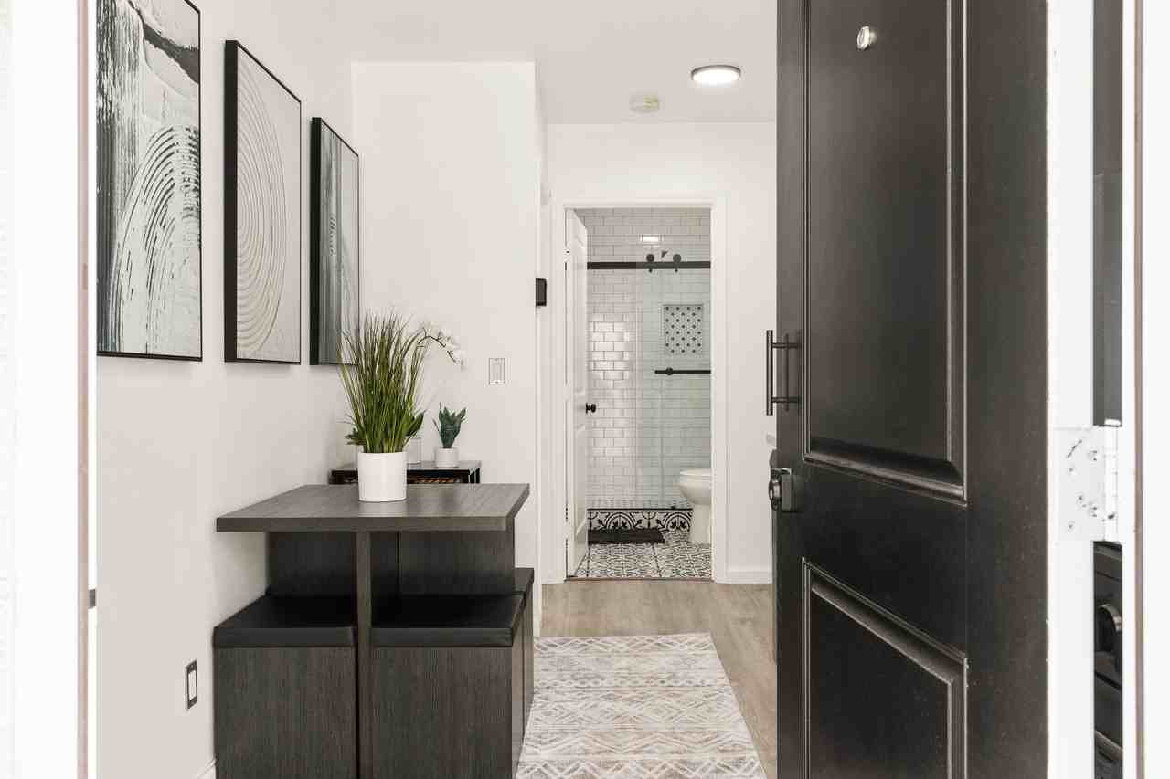 A 2 Bedroom, 1 Bathroom apartment with common areas and a fully functional kitchen at 1702 Malcolm Ave. - Photo 2 of 24