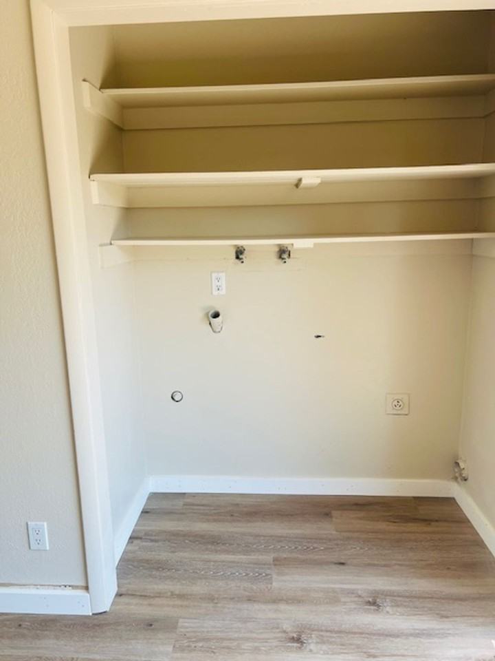 Beautiful single level town house for rent. New flooring and new paint throughout. Fenced Patio, Central Air, Carport. - Photo 7 of 7