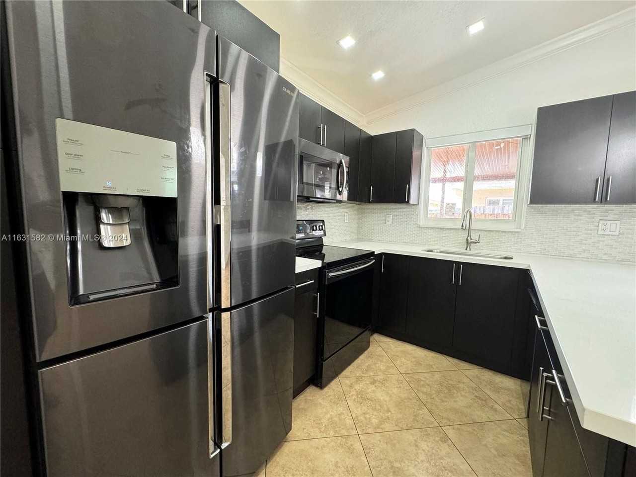 2875 W 72nd Ter - Photo 2 of 24