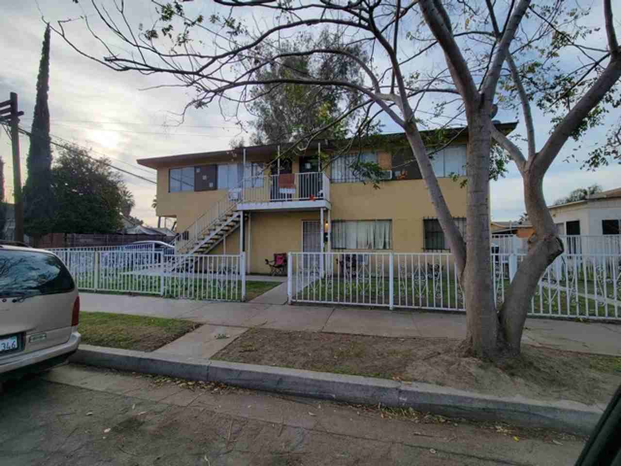 207-211 E 13th St - Photo 2 of 9