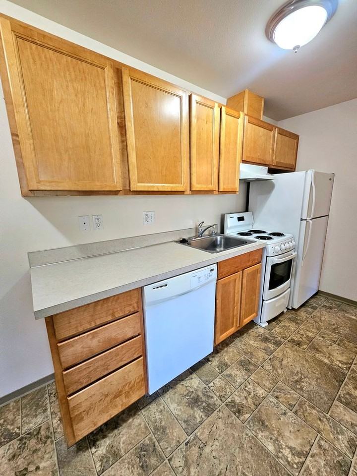 Village Apartments - Photo 2 of 9