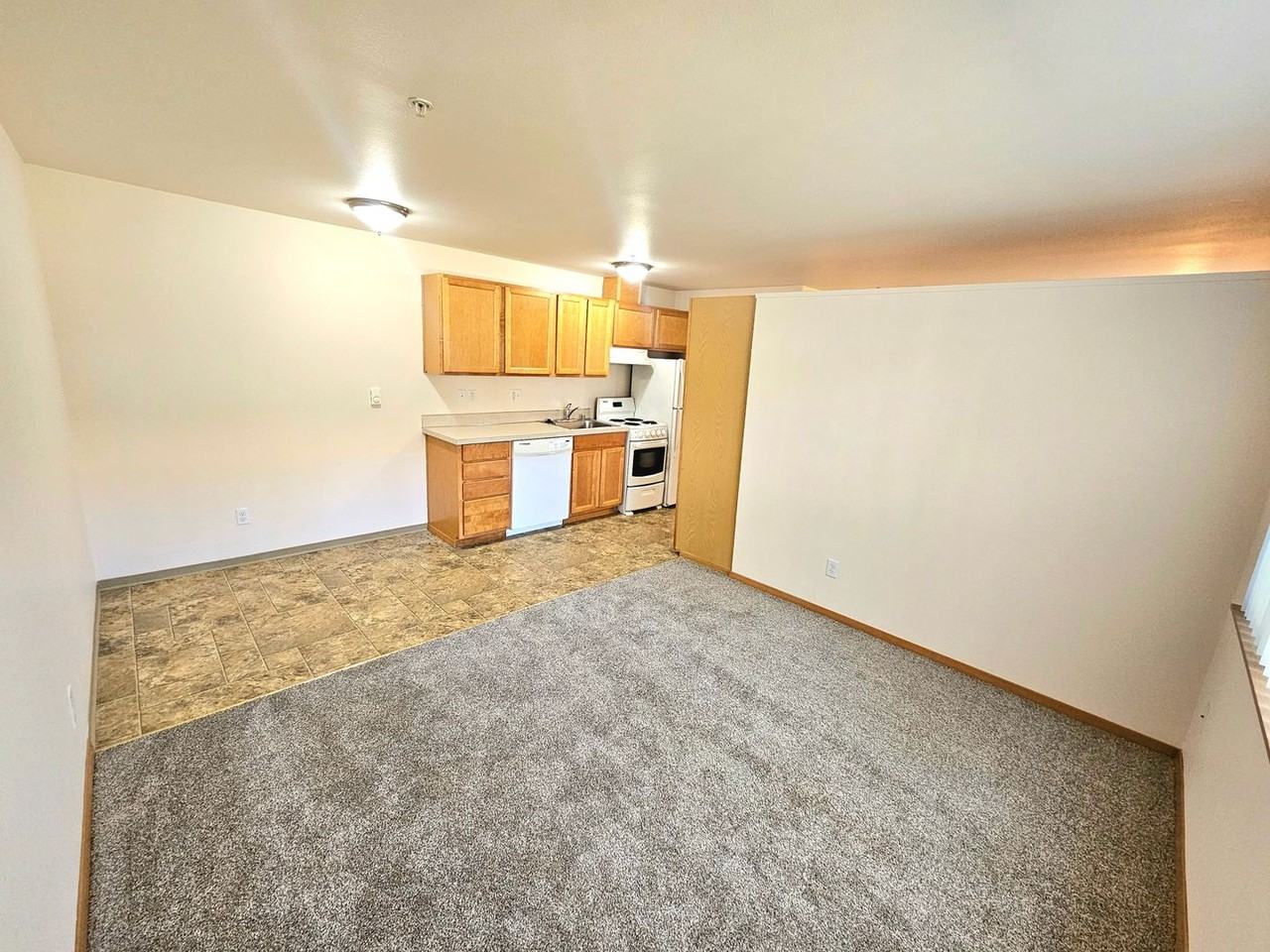 Village Apartments - Photo 3 of 9