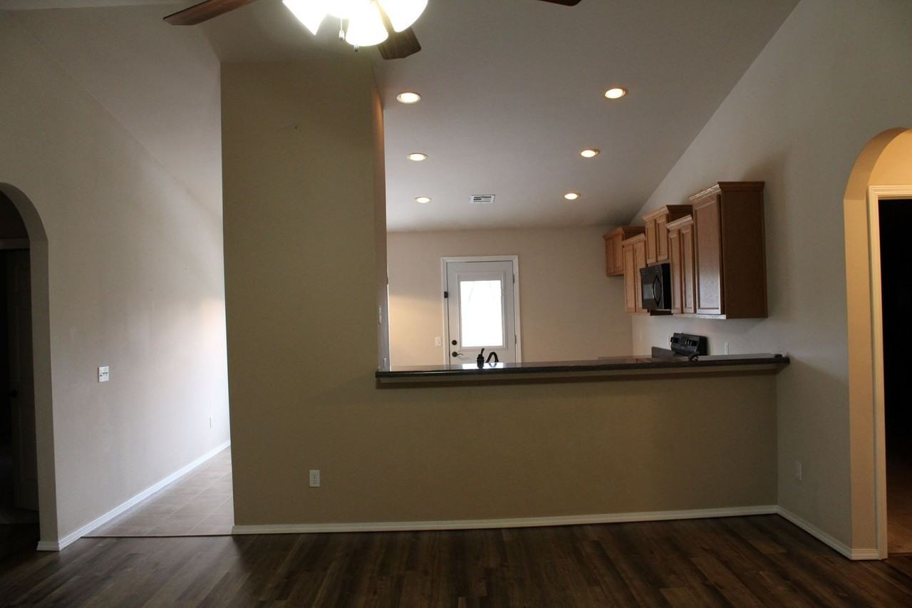 12403 N 110th East Ave - Photo 3 of 15
