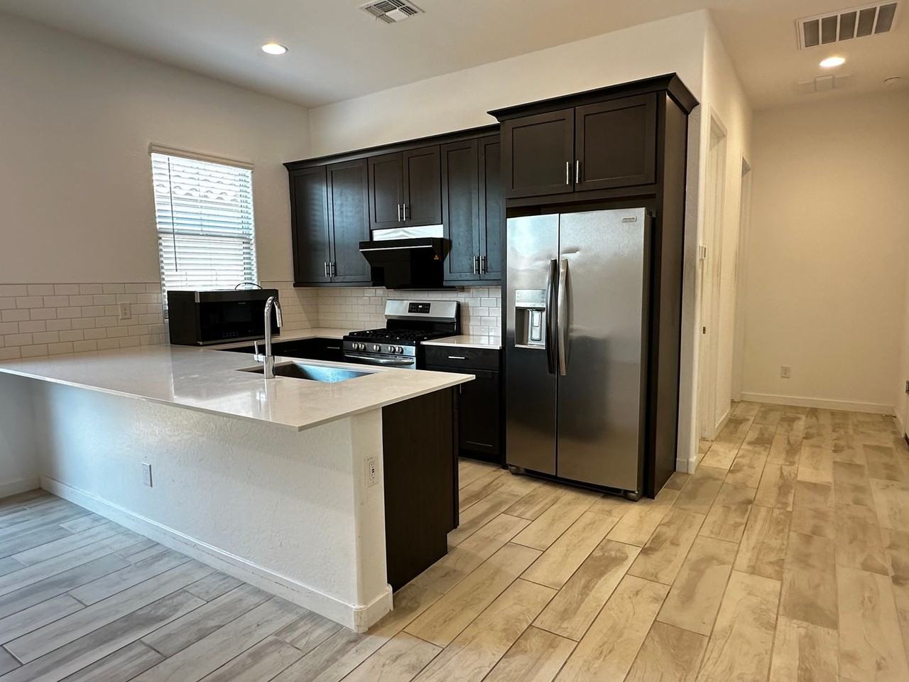 5851 S Delaware St - Photo 4 of 15