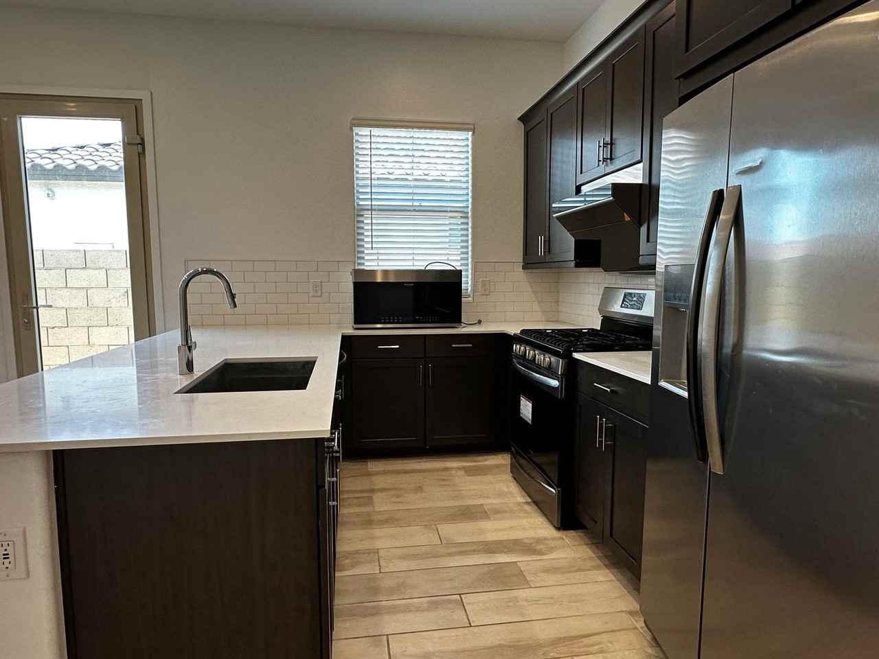 5851 S Delaware St - Photo 5 of 15