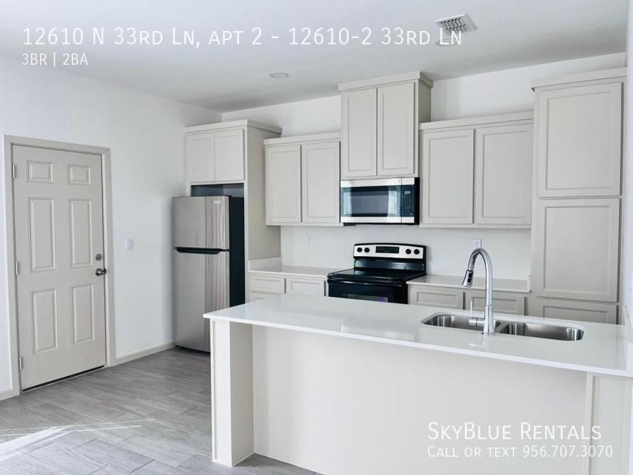 12610 N 33rd Ln - Photo 6 of 14