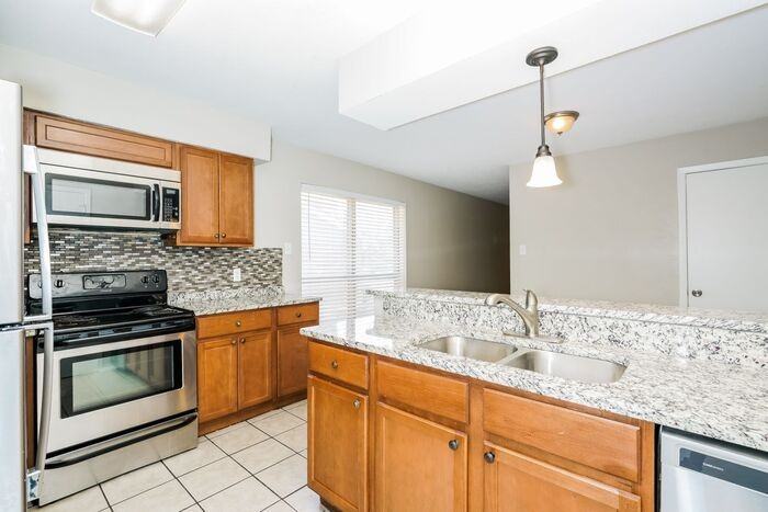 1201 Oakbluff Dr - Photo 2 of 25