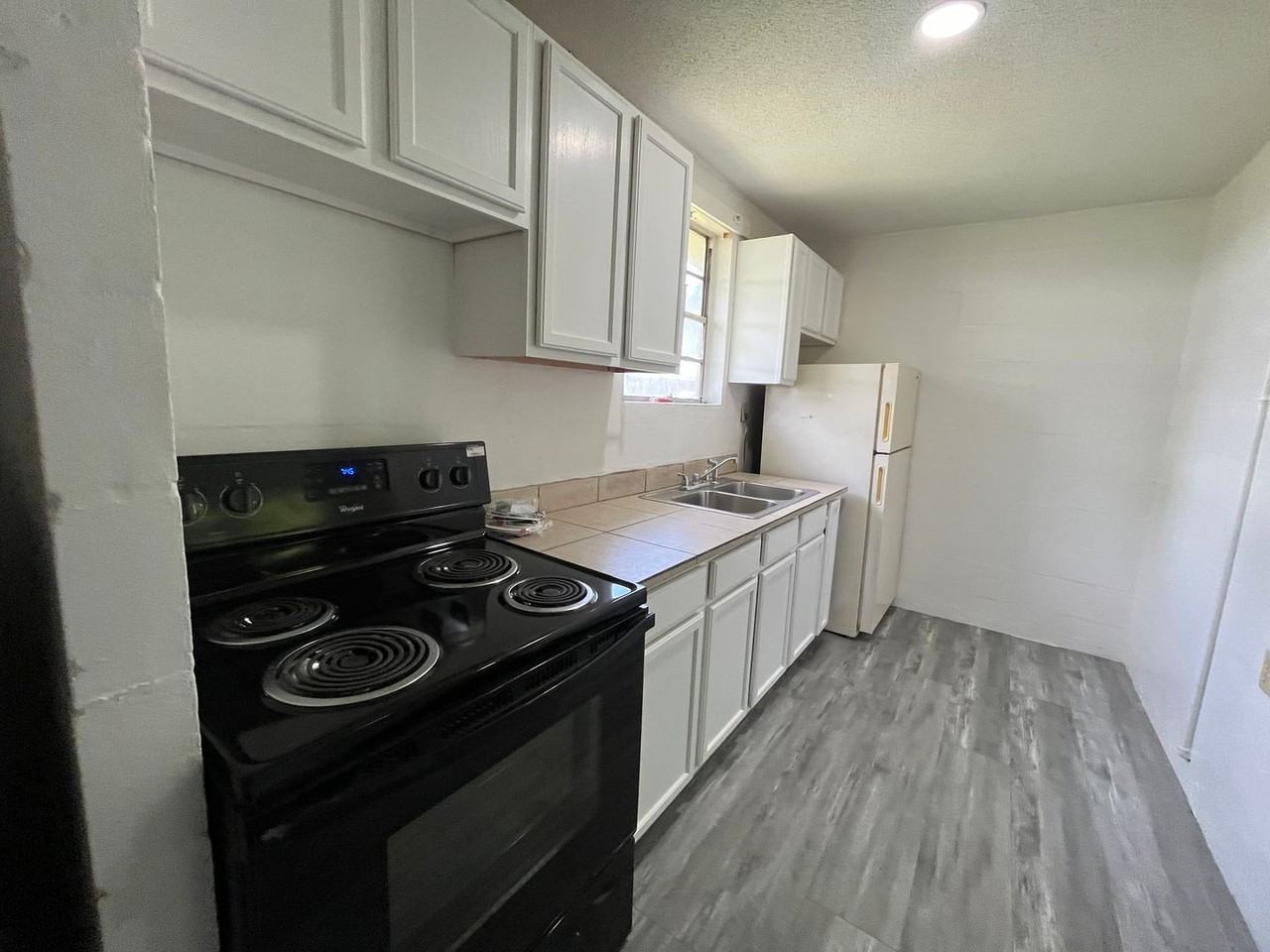 Floyd-McGee Apartments - Photo 5 of 16