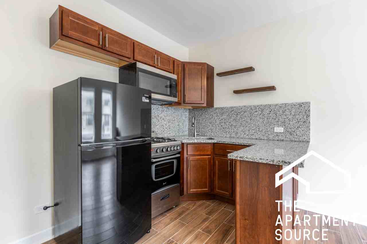 2712 N Milwaukee Ave #201 - Photo 2 of 10