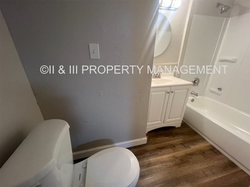 215 W 37th St - Photo 7 of 8
