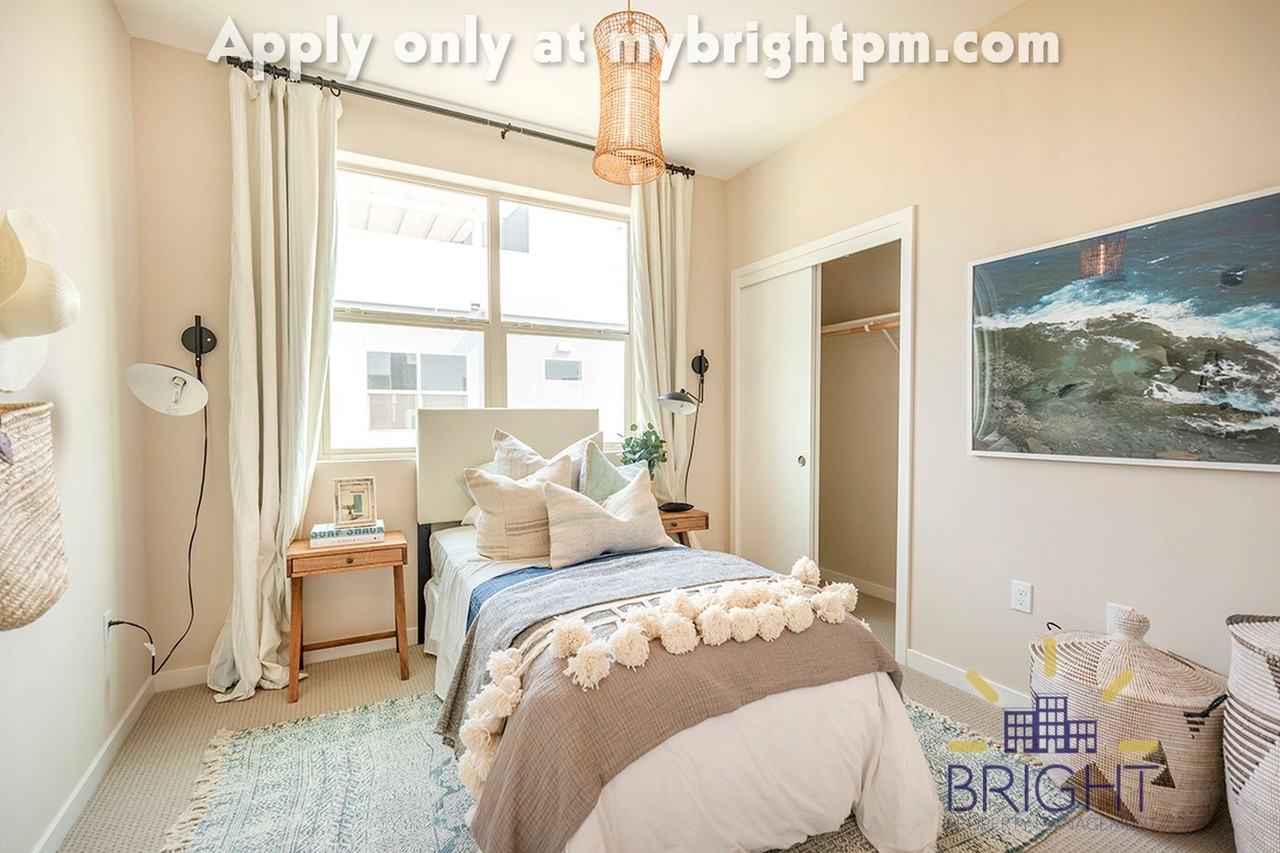 The Flats at The Mill at Broadway - Photo 2 of 19