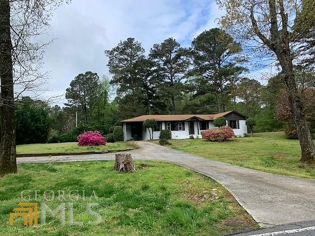 14100 Cogburn Rd - Photo 2 of 9