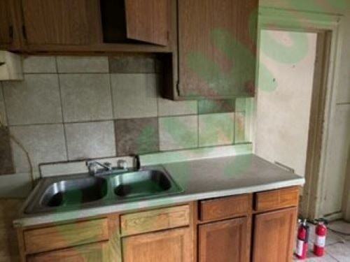 1220 West John H Gwynn Junior Avenue - Photo 4 of 7