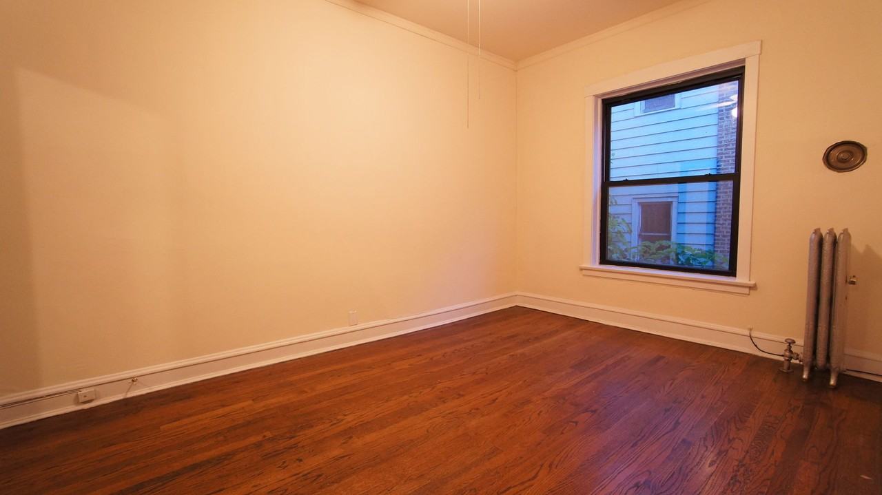 2418 Sawyer LLC - Photo 7 of 9