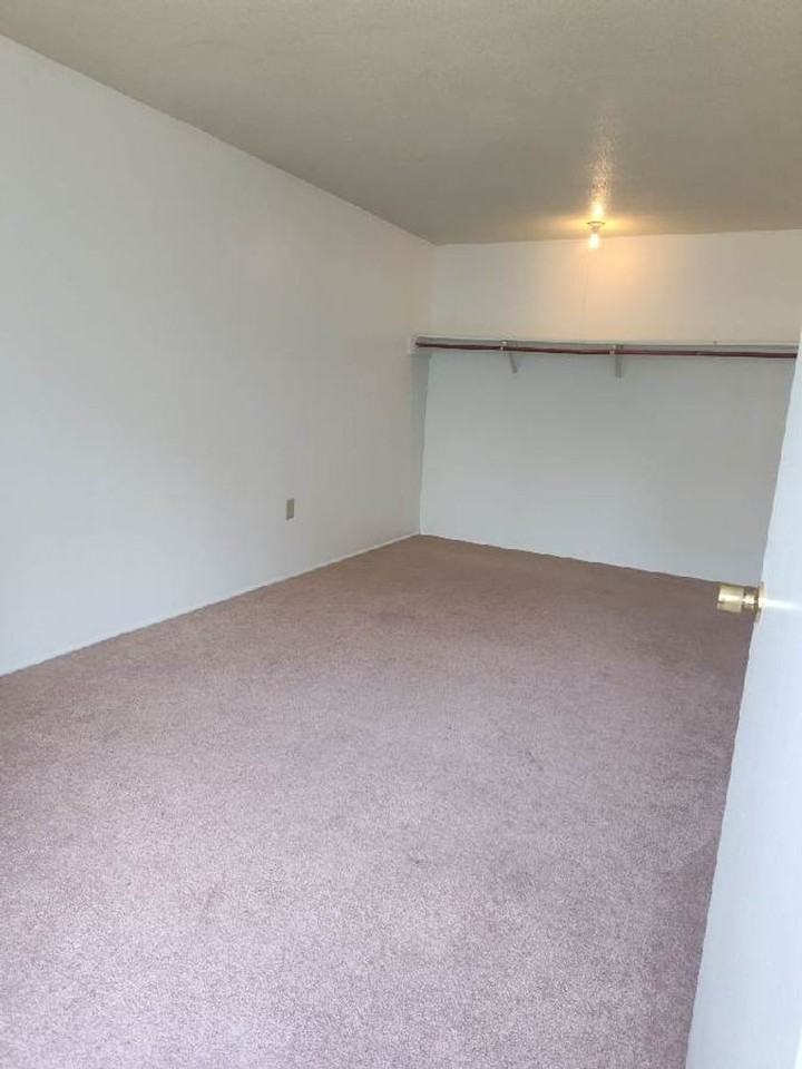 THE QUADS APARTMENTS - Photo 3 of 16