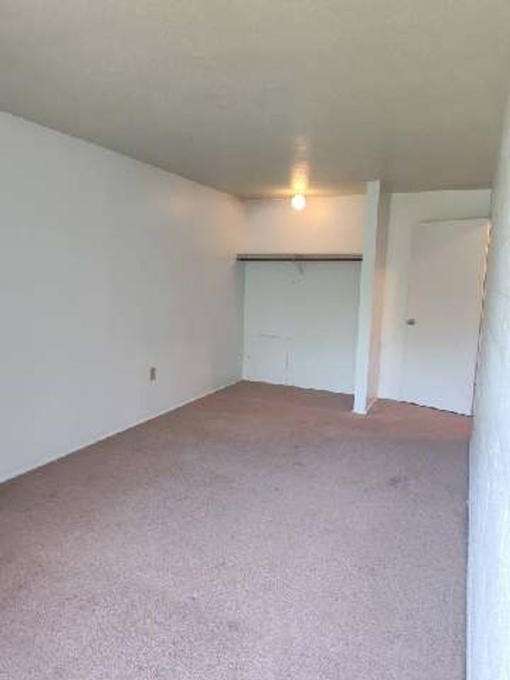 THE QUADS APARTMENTS - Photo 4 of 16