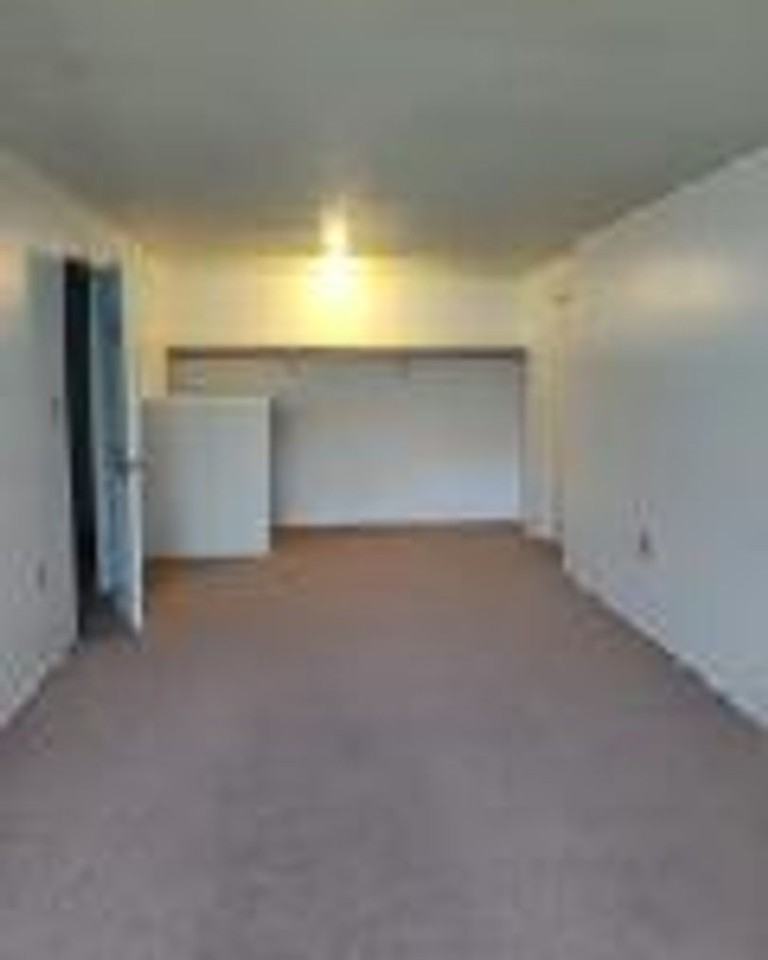 THE QUADS APARTMENTS - Photo 6 of 16